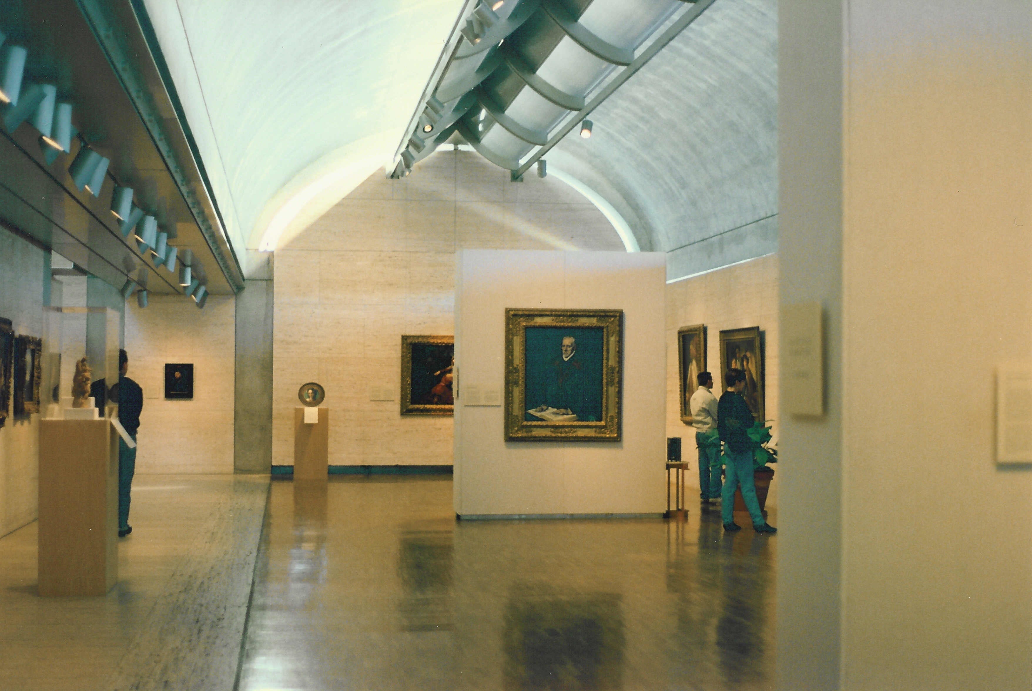 Interior of the Kimbell Art Museum in Fort Worth, Texas, showing Louis Kahn's barrel-vaulted galleries lit by natural light — the kind of museum environment studied in arts-on-prescription and museum well-being research