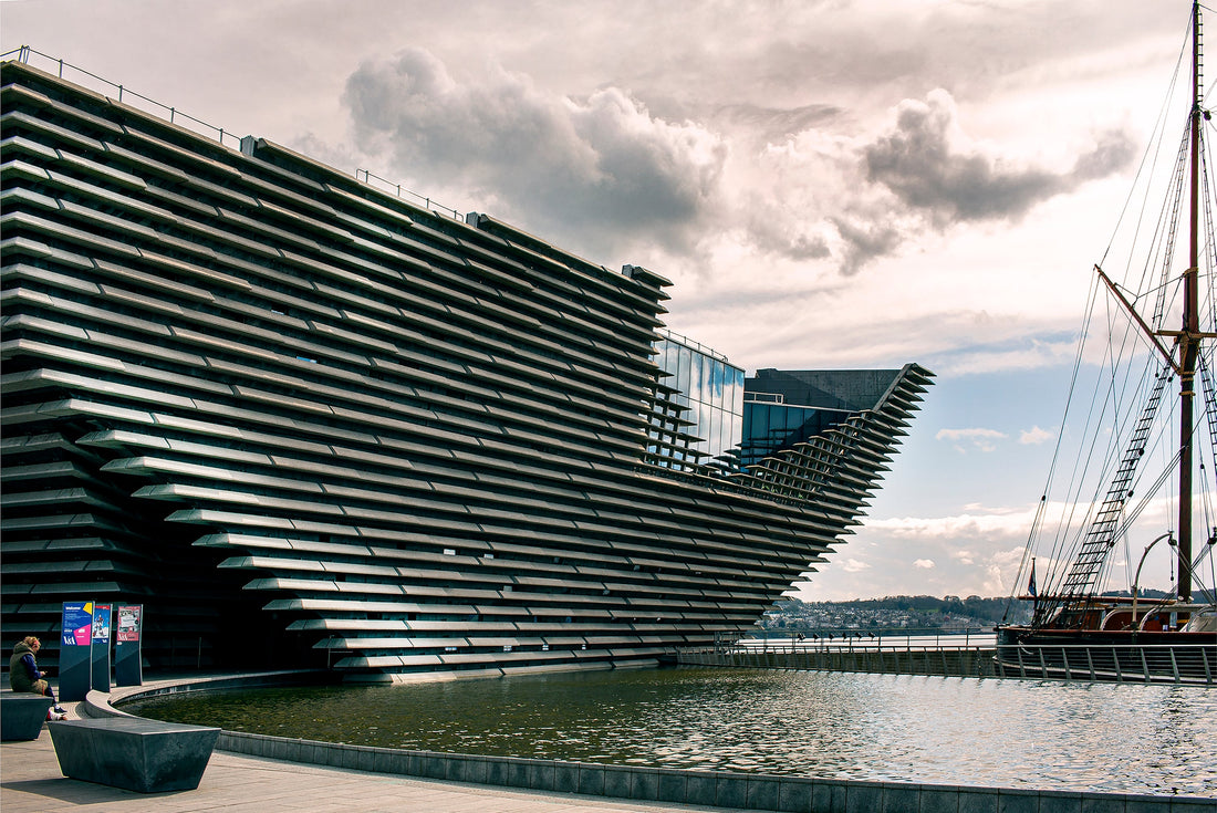 V&A Dundee, the Kengo Kuma-designed museum hosting the Maggie's: Architecture That Cares exhibition — dramatic cliff-like architecture and healing design, featured on Soulkeeper.2099